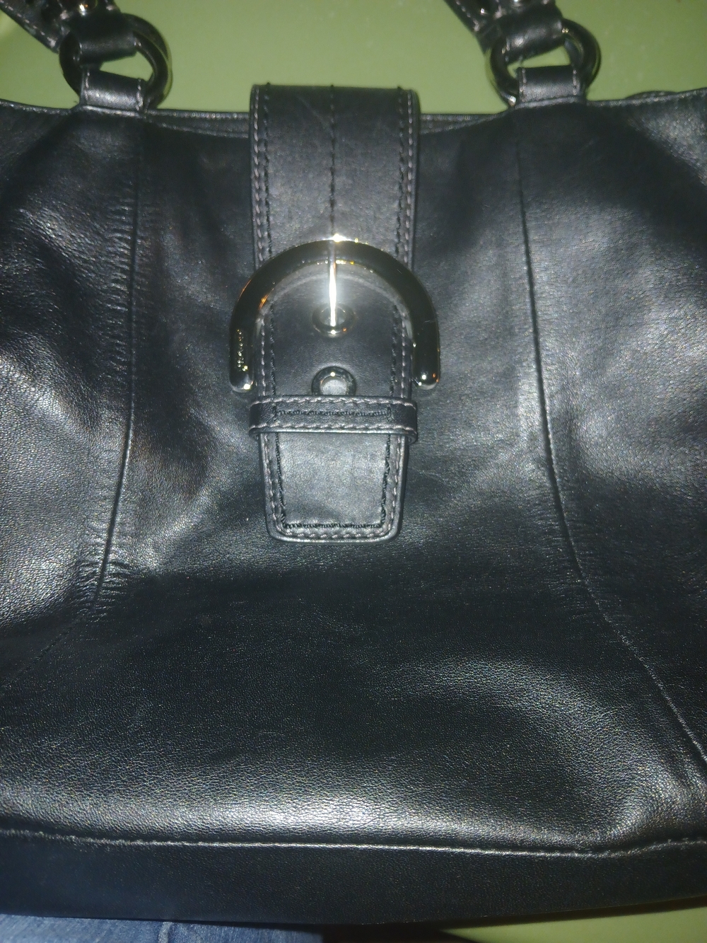 Coach Black Leather Handbag with Shiny Gold Accent